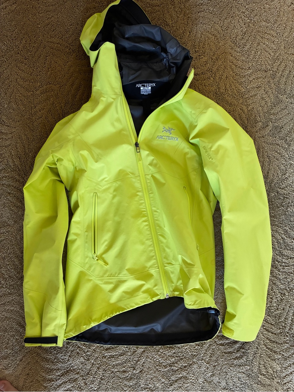 Arc’teryx Zeta SL Jacket Women’s in a vibrant neon yellow/Lumina color, size XS
